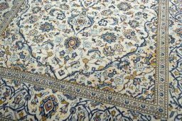Close-up detail of 2000s Kashan rug from Iran / Persia showing Wool weave