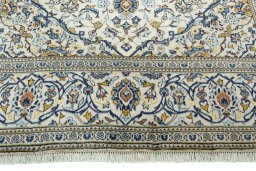 Full view of 2000s Kashan rug from Iran / Persia, 297 × 195 cm in Beige tones