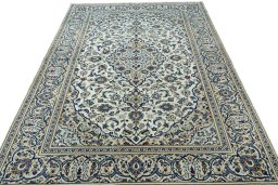 Surface texture of 2000s Kashan rug with natural Wool and intricate pattern