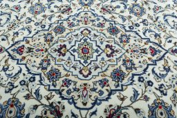 Central medallion detail of 2000s Kashan rug from Iran / Persia