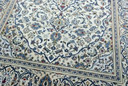 Close-up detail of 2000s Kashan rug from Iran / Persia showing Wool weave