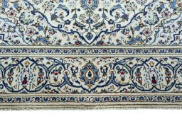 Full view of 2000s Kashan rug from Iran / Persia, 296 × 200 cm in Beige tones