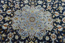 Central medallion detail of 2000s Kashan rug from Iran / Persia