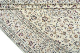 Close-up detail of 2000s Kashan rug from Iran / Persia showing Wool weave