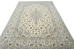 Surface texture of 2000s Kashan rug with natural Wool and intricate pattern