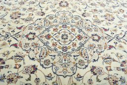 Central medallion detail of 2000s Kashan rug from Iran / Persia