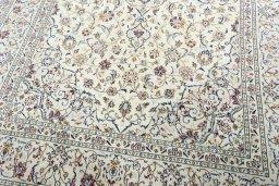 Close-up detail of 2000s Kashan rug from Iran / Persia showing Wool weave