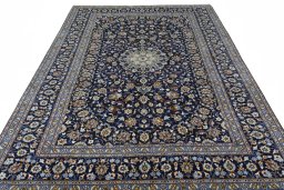 Surface texture of 2000s Kashan rug with natural Wool and intricate pattern