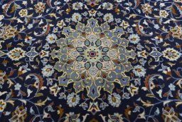 Central medallion detail of 2000s Kashan rug from Iran / Persia