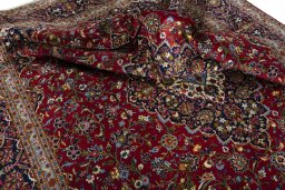 Surface texture of 2000s Kashan rug with natural Cork and intricate pattern