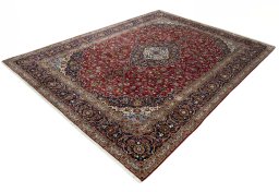 Corner detail of 2000s Kashan rug showing border pattern and Cork pile