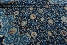 Close-up detail of 2000s Kashan rug from Iran / Persia showing Wool weave