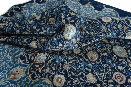 Surface texture of 2000s Kashan rug with natural Wool and intricate pattern