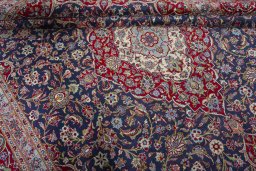 Close-up detail of 2000s Kashan rug from Iran / Persia showing Cork weave