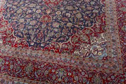 Close-up detail of 2000s Kashan rug from Iran / Persia showing Cork weave