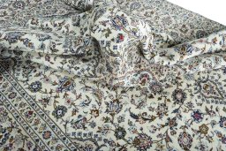 Surface texture of 2000s Kashan rug with natural Wool and intricate pattern