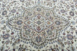 Central medallion detail of 2000s Kashan rug from Iran / Persia