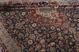 Close-up detail of 2000s Kashan rug from Iran / Persia showing Cork weave