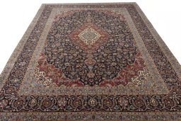 Surface texture of 2000s Kashan rug with natural Cork and intricate pattern
