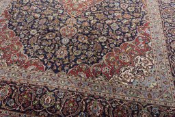 Close-up detail of 2000s Kashan rug from Iran / Persia showing Cork weave