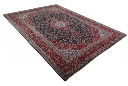 Close-up detail of 2000s Kashan rug from Iran / Persia showing Wool weave