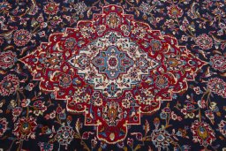 Central medallion detail of 2000s Kashan rug from Iran / Persia