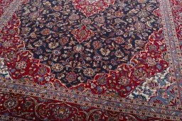 Close-up detail of 2000s Kashan rug from Iran / Persia showing Wool weave