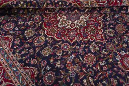 Close-up detail of 1970s Kashan rug from Iran / Persia showing Wool weave