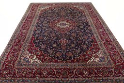 Surface texture of 1970s Kashan rug with natural Wool and intricate pattern