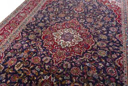 Backside of handmade 1970s Kashan rug showing knot structure and weave density