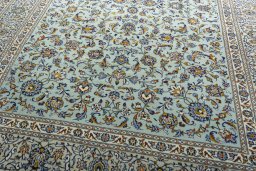 Close-up detail of 2000s Kashan rug from Iran / Persia showing Wool weave