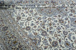 Close-up detail of 2000s Kashan rug from Iran / Persia showing Wool weave