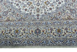 Full view of 2000s Kashan rug from Iran / Persia, 405 × 298 cm in Beige tones