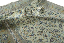Surface texture of 2000s Kashan rug with natural Cork and intricate pattern