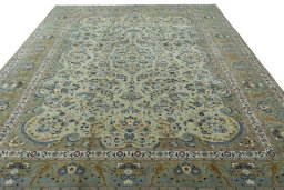 Surface texture of 2000s Kashan rug with natural Cork and intricate pattern