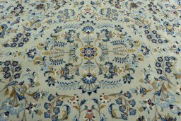Central medallion detail of 2000s Kashan rug from Iran / Persia