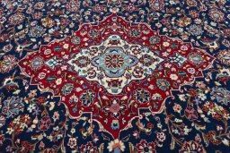 Central medallion detail of 2000s Kashan rug from Iran / Persia