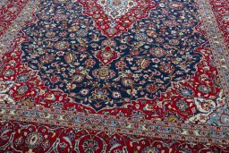Close-up detail of 2000s Kashan rug from Iran / Persia showing Wool weave