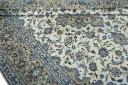 Close-up detail of 2000s Kashan rug from Iran / Persia showing Wool weave