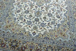 Close-up detail of 2000s Kashan rug from Iran / Persia showing Wool weave
