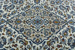 Central medallion detail of 2000s Kashan rug from Iran / Persia
