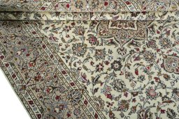 Close-up detail of 2000s Kashan rug from Iran / Persia showing Wool weave