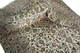 Surface texture of 2000s Kashan rug with natural Wool and intricate pattern