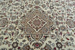Central medallion detail of 2000s Kashan rug from Iran / Persia