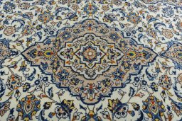 Central medallion detail of 2000s Kashan rug from Iran / Persia