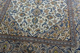 Close-up detail of 2000s Kashan rug from Iran / Persia showing Wool weave