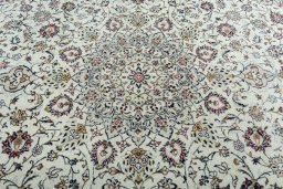 Central medallion detail of 2000s Kashan rug from Iran / Persia