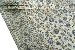 Close-up detail of 2000s Kashan rug from Iran / Persia showing Wool weave