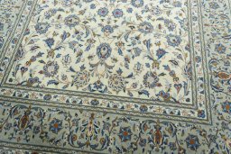 Close-up detail of 2000s Kashan rug from Iran / Persia showing Wool weave