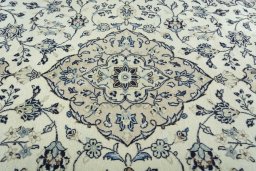 Central medallion detail of 2000s Kashan rug from Iran / Persia